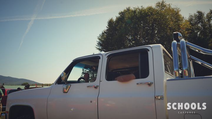White crew cab with roof lights